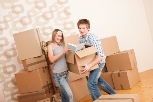 Professional movers handling boxes during a Blackfriars relocation